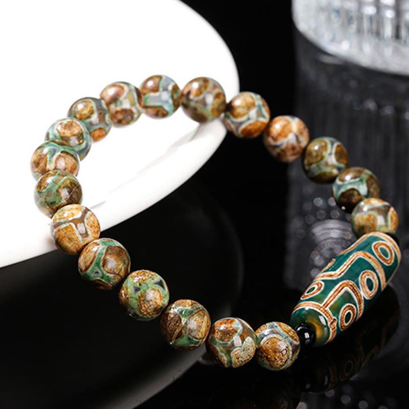 Pulsera de protección de energía con Buddha Stones de nueve ojos tibetanas de sándalo natural y ágata de ojo de gato blanca