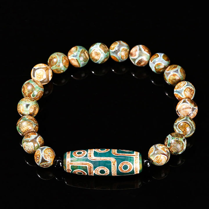 Pulsera de protección de energía con Buddha Stones de nueve ojos tibetanas de sándalo natural y ágata de ojo de gato blanca
