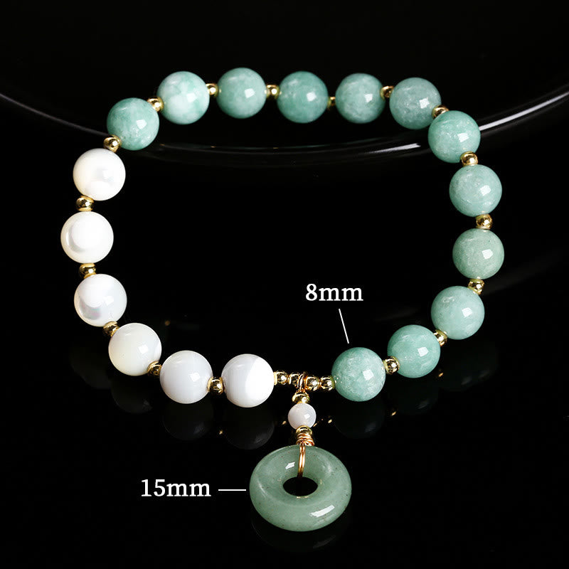 Pulsera con dije de paz y hebilla de caracol, herradura, trochus y Buddha Stones