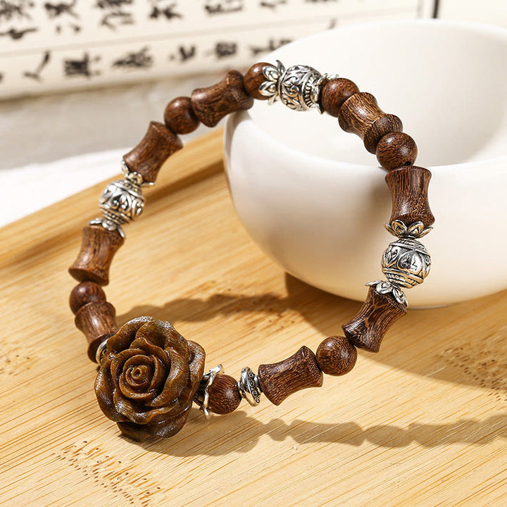 Pulsera curativa con diseño de camelias y Buddha Stones , madera de sándalo y bambú