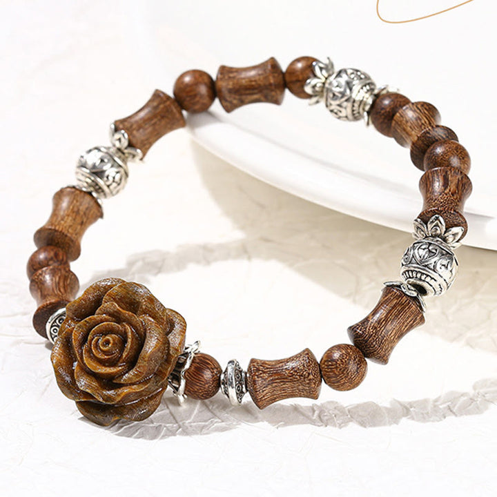 Pulsera curativa con diseño de camelias y Buddha Stones , madera de sándalo y bambú