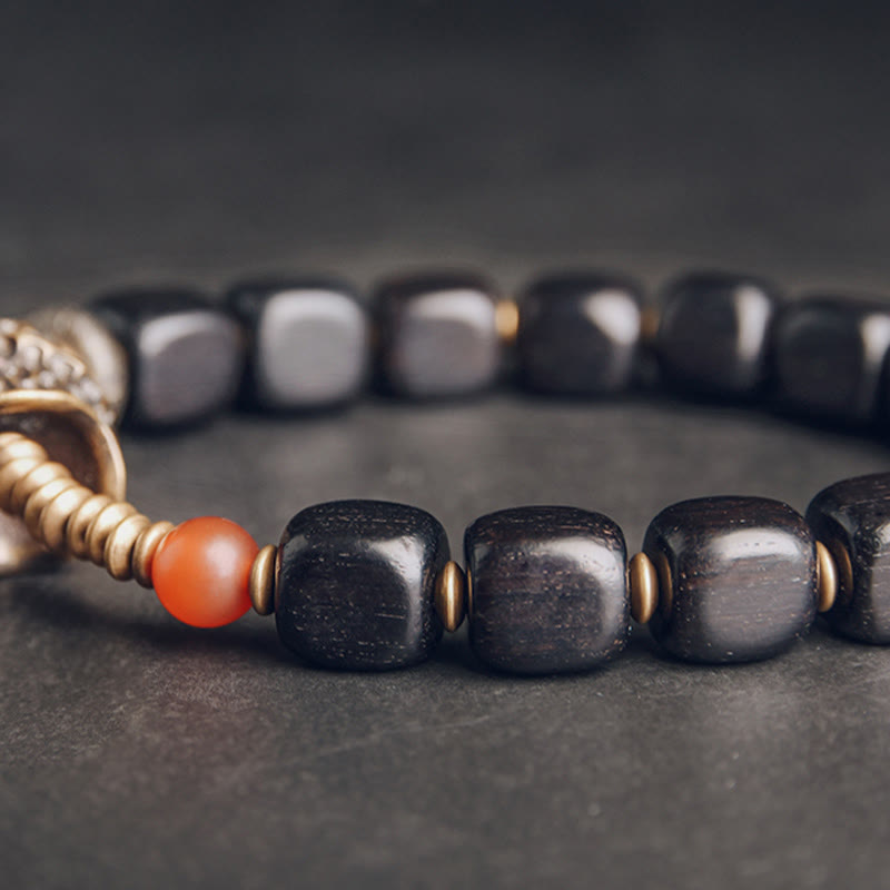 Pulsera de la paz con Buddha Stones, ébano, madera, cobre, latón y ágata roja