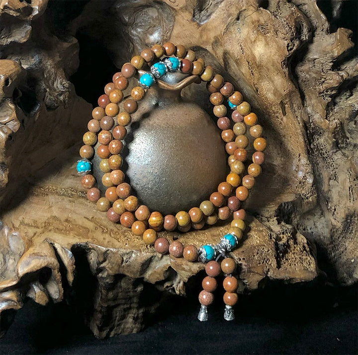 Pulsera curativa con Buddha Stones y 108 cuentas de mala Bian