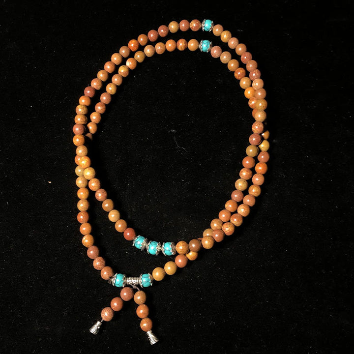 Pulsera curativa con Buddha Stones y 108 cuentas de mala Bian