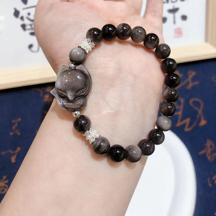 Pulsera de comunicación de zorro de nueve colas con obsidiana y brillo plateado natural de Buddha Stones