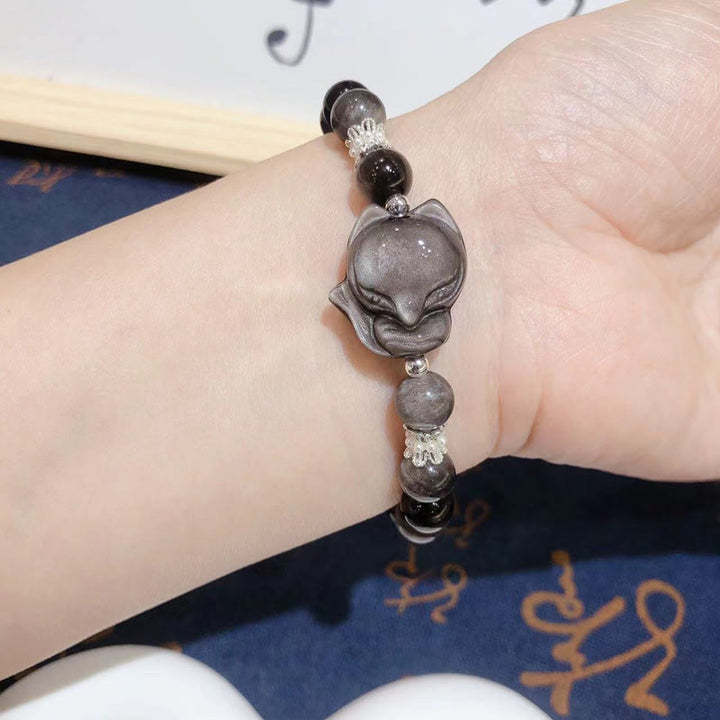 Pulsera de comunicación de zorro de nueve colas con obsidiana y brillo plateado natural de Buddha Stones