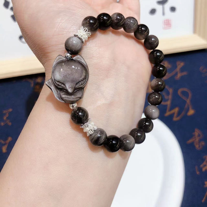 Pulsera de comunicación de zorro de nueve colas con obsidiana y brillo plateado natural de Buddha Stones