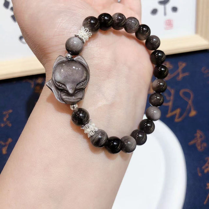 Pulsera de comunicación de zorro de nueve colas con obsidiana y brillo plateado natural de Buddha Stones