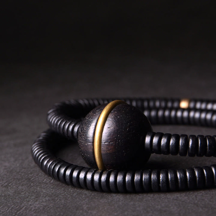 Pulsera de doble vuelta con forma de cubo y bola de equilibrio de latón, cobre y madera de ébano y Buddha Stones