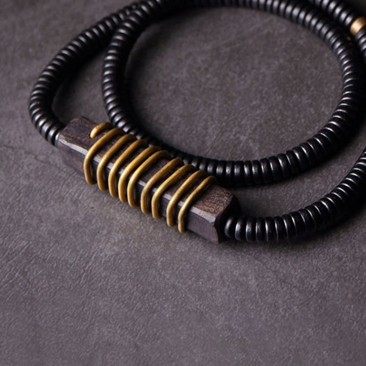 Pulsera de doble vuelta con forma de cubo y bola de equilibrio de latón, cobre y madera de ébano y Buddha Stones