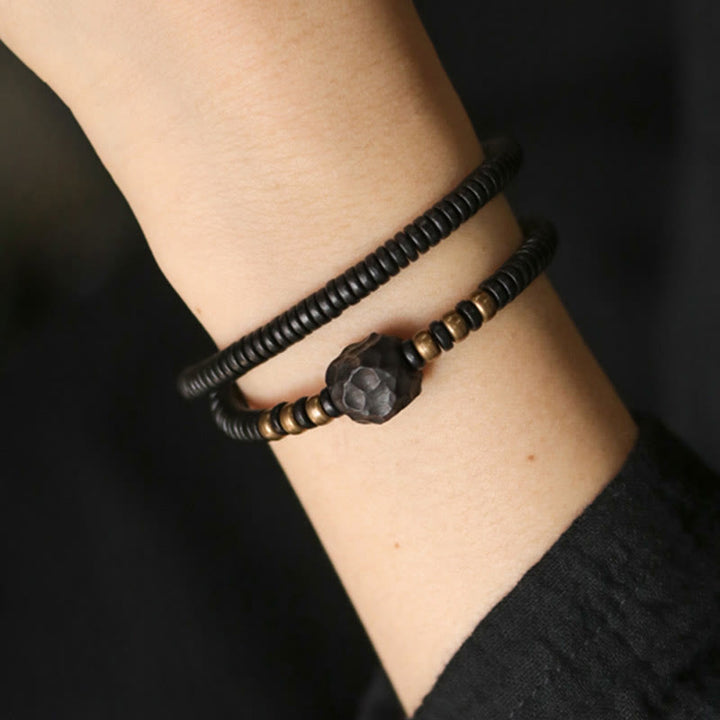 Pulsera de doble vuelta con Buddha Stones, madera de ébano, cobre y latón