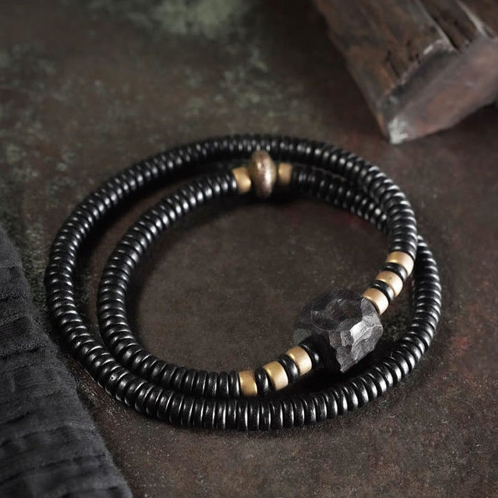 Pulsera de doble vuelta con Buddha Stones, madera de ébano, cobre y latón