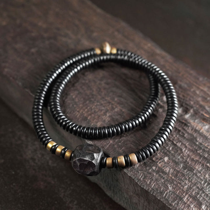 Pulsera de doble vuelta con Buddha Stones, madera de ébano, cobre y latón