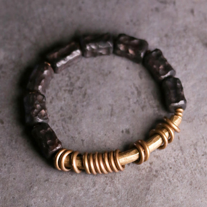 Pulsera de la paz con anillo circular de cobre, latón, madera y ébano con Buddha Stones