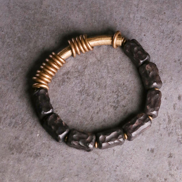 Pulsera de la paz con anillo circular de cobre, latón, madera y ébano con Buddha Stones