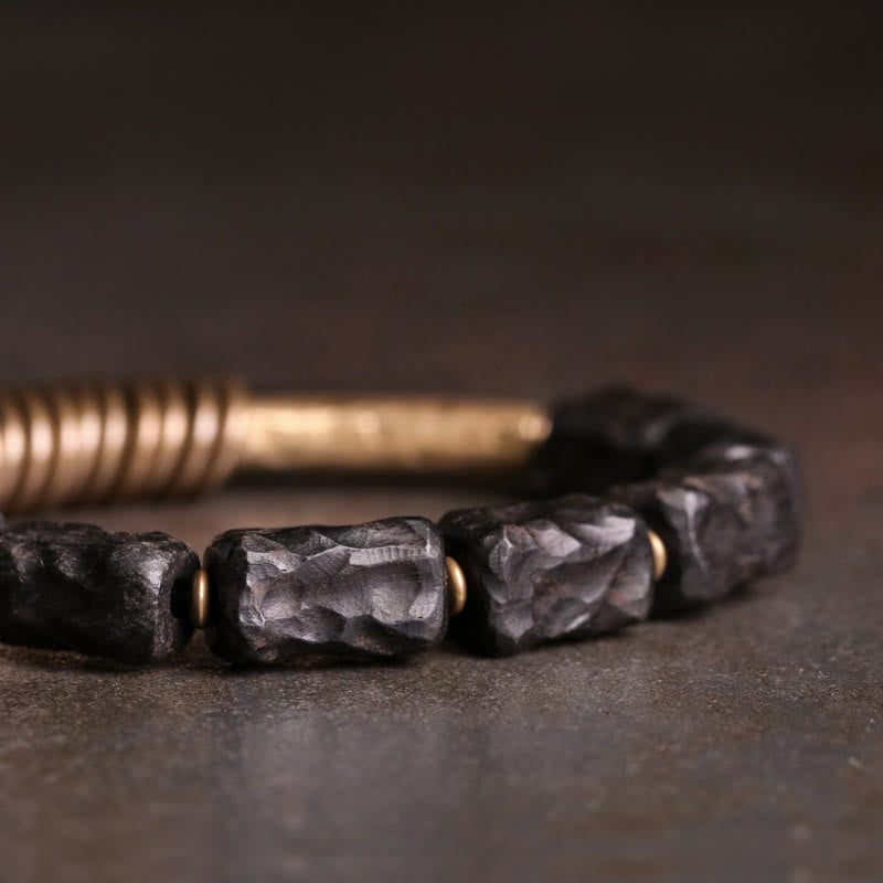 Pulsera de la paz con anillo circular de cobre, latón, madera y ébano con Buddha Stones