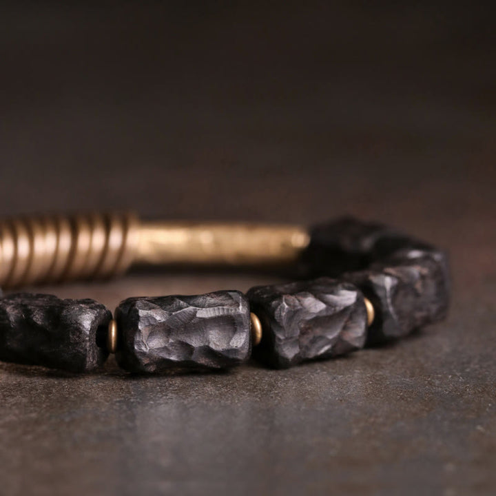 Pulsera de la paz con anillo circular de cobre, latón, madera y ébano con Buddha Stones