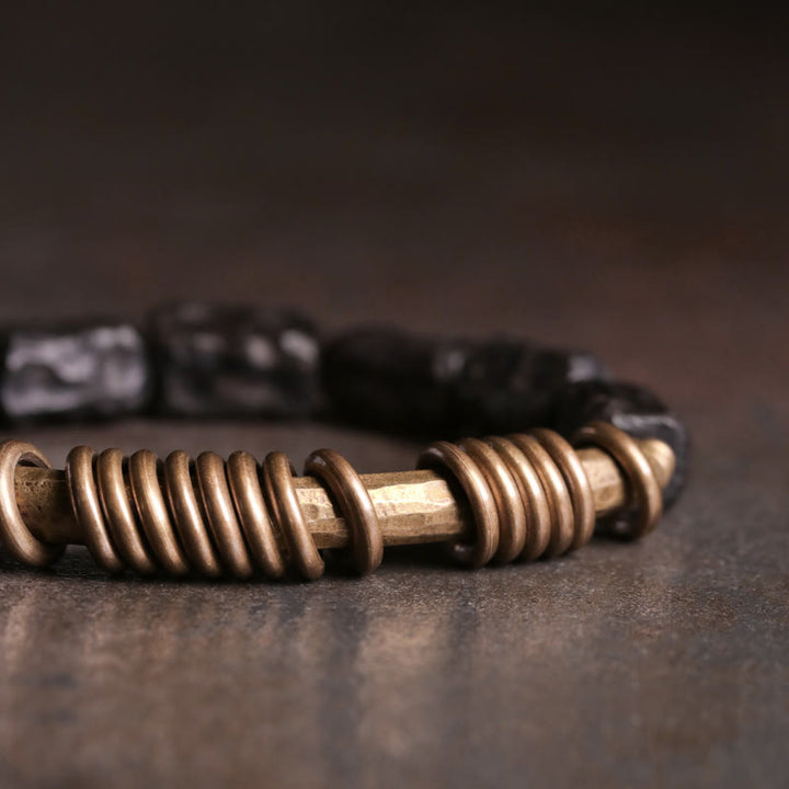Pulsera de la paz con anillo circular de cobre, latón, madera y ébano con Buddha Stones
