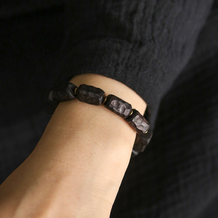 Pulsera de la paz con anillo circular de cobre, latón, madera y ébano con Buddha Stones