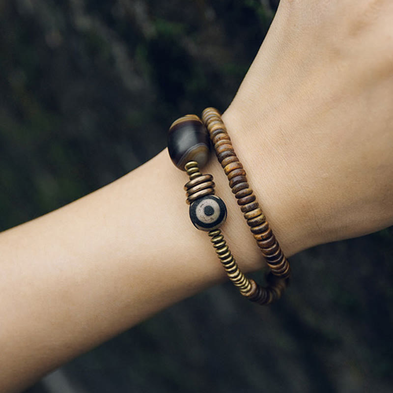 Pulsera de doble vuelta con cuentas Dzi de latón, cobre, sándalo verde, madera de ébano y Buddha Stones