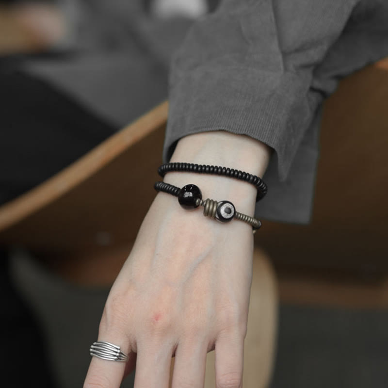 Pulsera de doble vuelta con cuentas Dzi de latón, cobre, sándalo verde, madera de ébano y Buddha Stones
