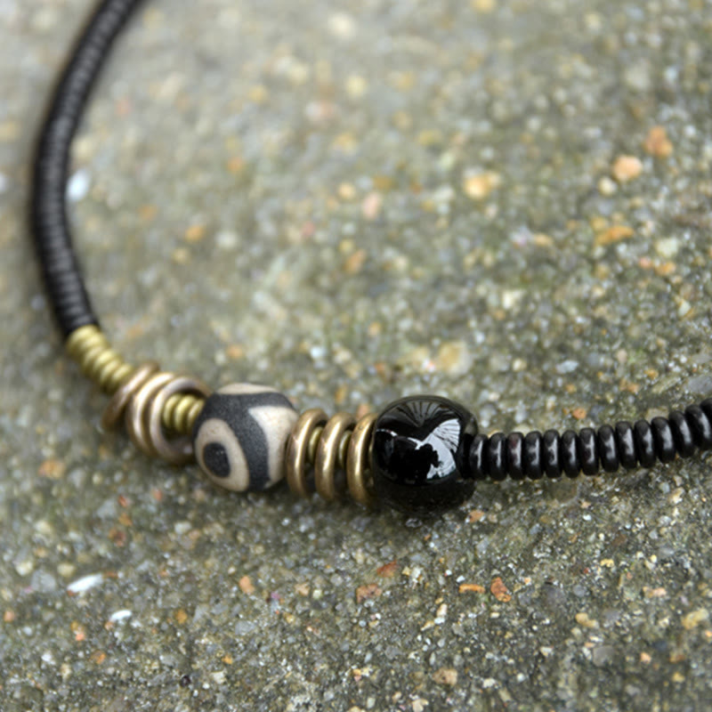 Pulsera de doble vuelta con cuentas Dzi de latón, cobre, sándalo verde, madera de ébano y Buddha Stones