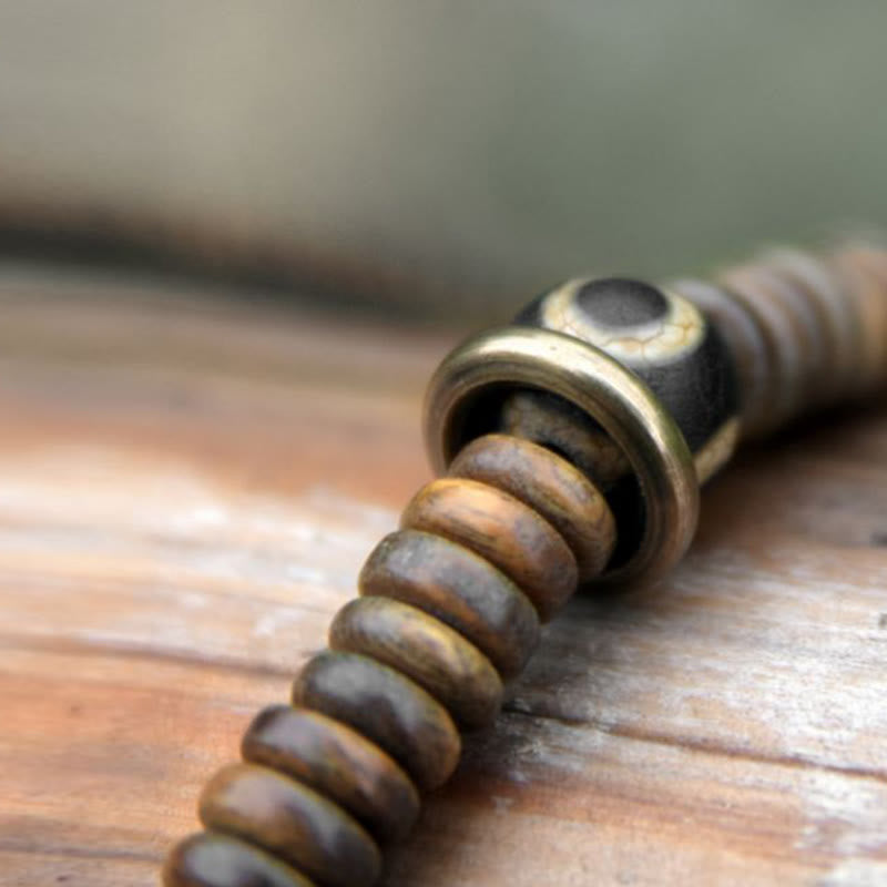 Pulsera de doble vuelta con cuentas Dzi de latón, cobre, sándalo verde, madera de ébano y Buddha Stones