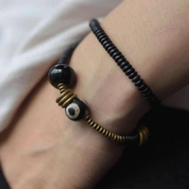 Pulsera de doble vuelta con cuentas Dzi de latón, cobre, sándalo verde, madera de ébano y Buddha Stones