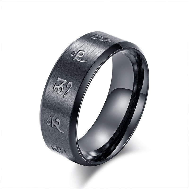 Anillo de equilibrio de acero y titanio con mantra Jambhala negro y Buddha Stones