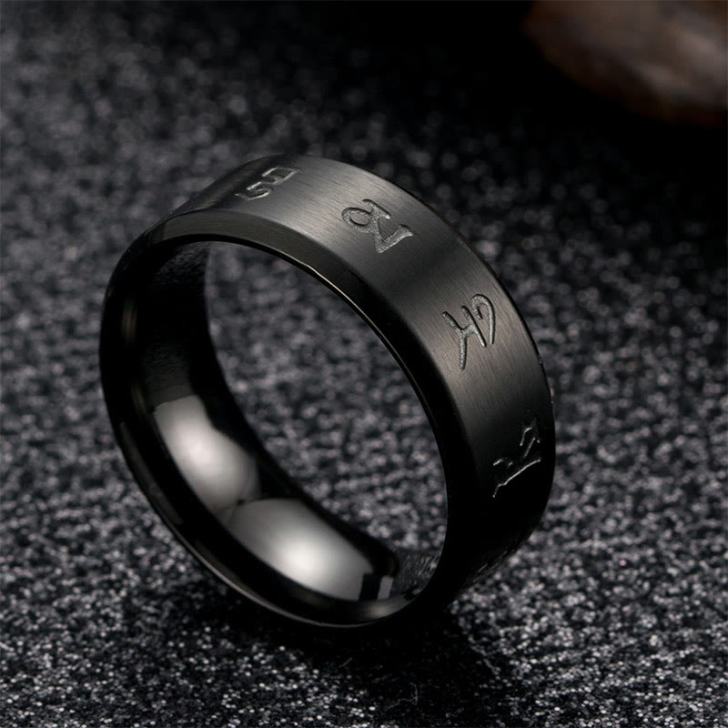 Anillo de equilibrio de acero y titanio con mantra Jambhala negro y Buddha Stones