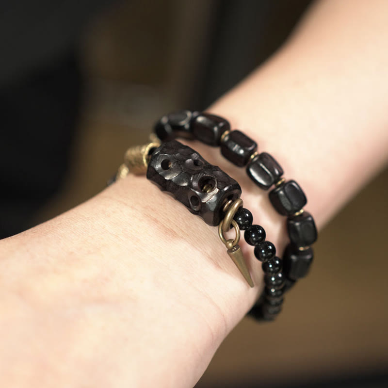 Pulsera de doble vuelta con Buddha Stones, madera de ébano, obsidiana negra, cobre y latón