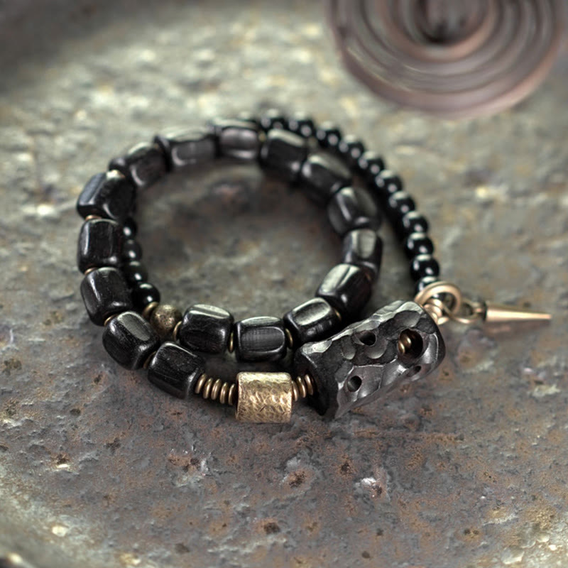 Pulsera de doble vuelta con Buddha Stones, madera de ébano, obsidiana negra, cobre y latón