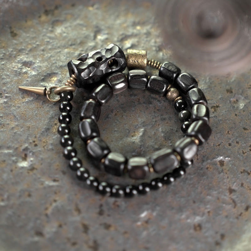 Pulsera de doble vuelta con Buddha Stones, madera de ébano, obsidiana negra, cobre y latón