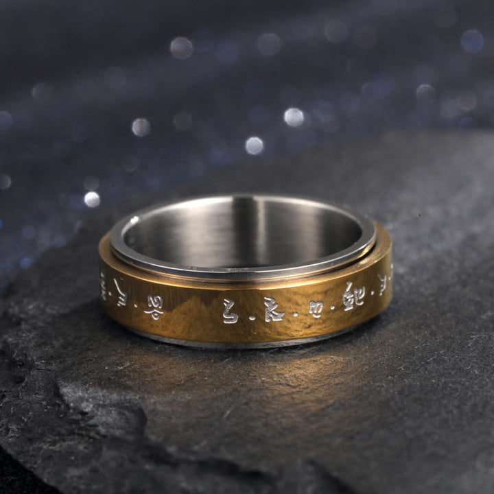 Anillo giratorio de equilibrio de acero y titanio con mantra tibetano y Buddha Stones