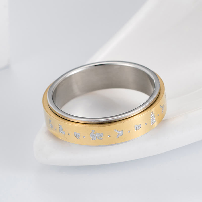 Anillo giratorio de equilibrio de acero y titanio con mantra tibetano y Buddha Stones