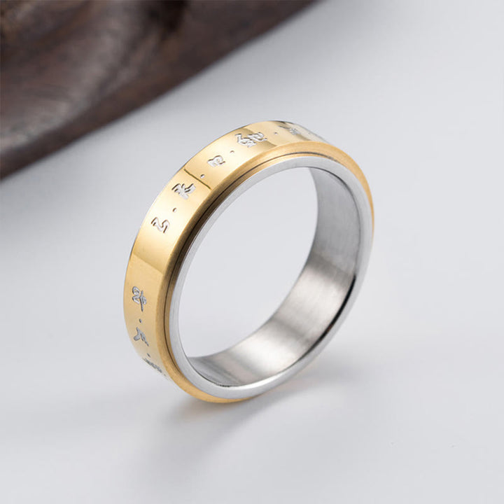 Anillo giratorio de equilibrio de acero y titanio con mantra tibetano y Buddha Stones