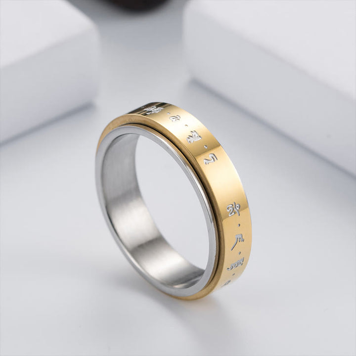 Anillo giratorio de equilibrio de acero y titanio con mantra tibetano y Buddha Stones