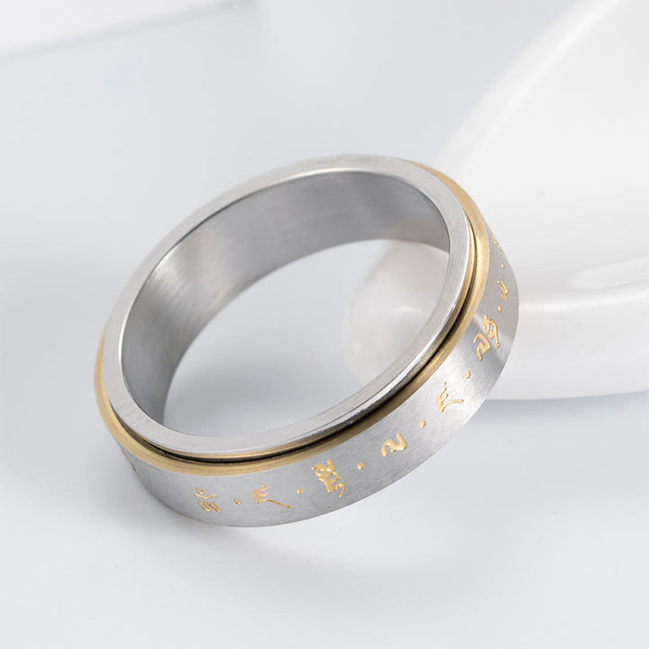 Anillo giratorio de equilibrio de acero y titanio con mantra tibetano y Buddha Stones