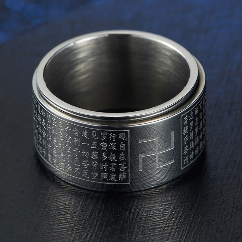 Anillo giratorio de acero y titanio con sutras y esvásticas de Buddha Stones