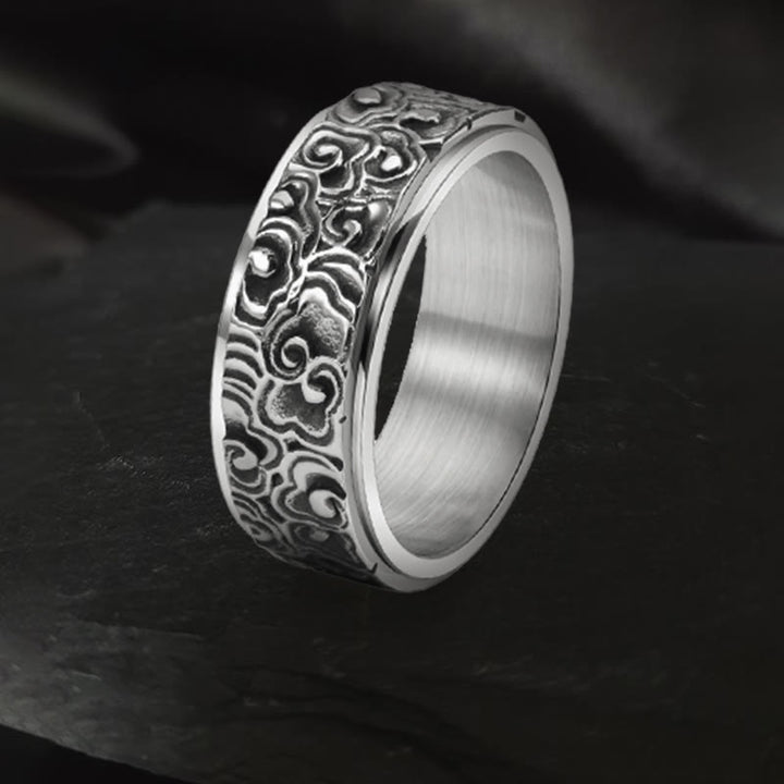 Anillo giratorio de equilibrio de acero de titanio tallado con patrón de nubes auspiciosas y Buddha Stones