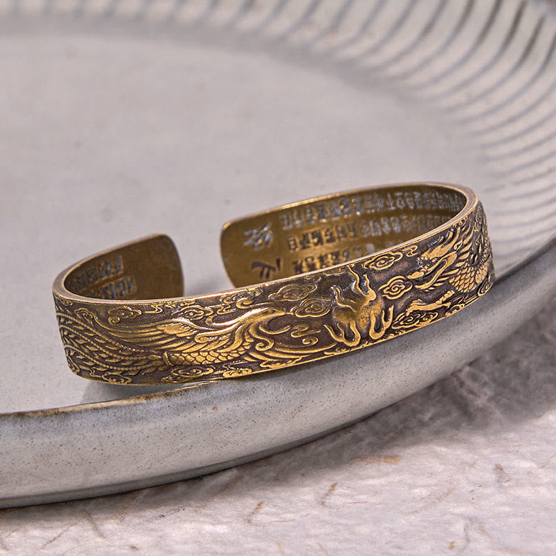 Pulsera de cobre y latón con la suerte tallada en sutra del corazón con Buddha Stones, dragón y fénix jugando con una perla