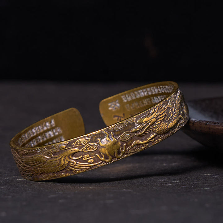 Pulsera de cobre y latón con la suerte tallada en sutra del corazón con Buddha Stones, dragón y fénix jugando con una perla