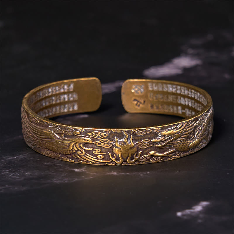 Pulsera de cobre y latón con la suerte tallada en sutra del corazón con Buddha Stones, dragón y fénix jugando con una perla