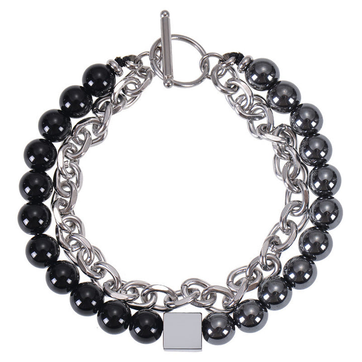 Pulsera de protección de doble envoltura de acero y titanio con magnetita negra y piedra esmerilada de ojo de tigre de colores de Buddha Stones