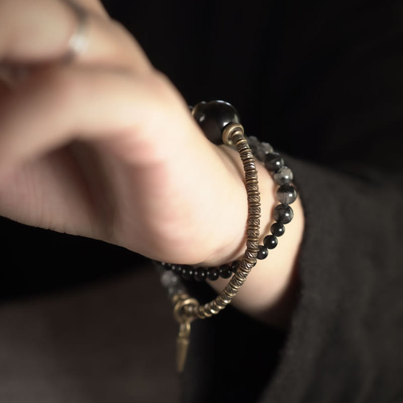 Pulsera protectora de doble vuelta con Buddha Stones, obsidiana negra con brillo dorado, cuarzo rutilado, cobre y latón