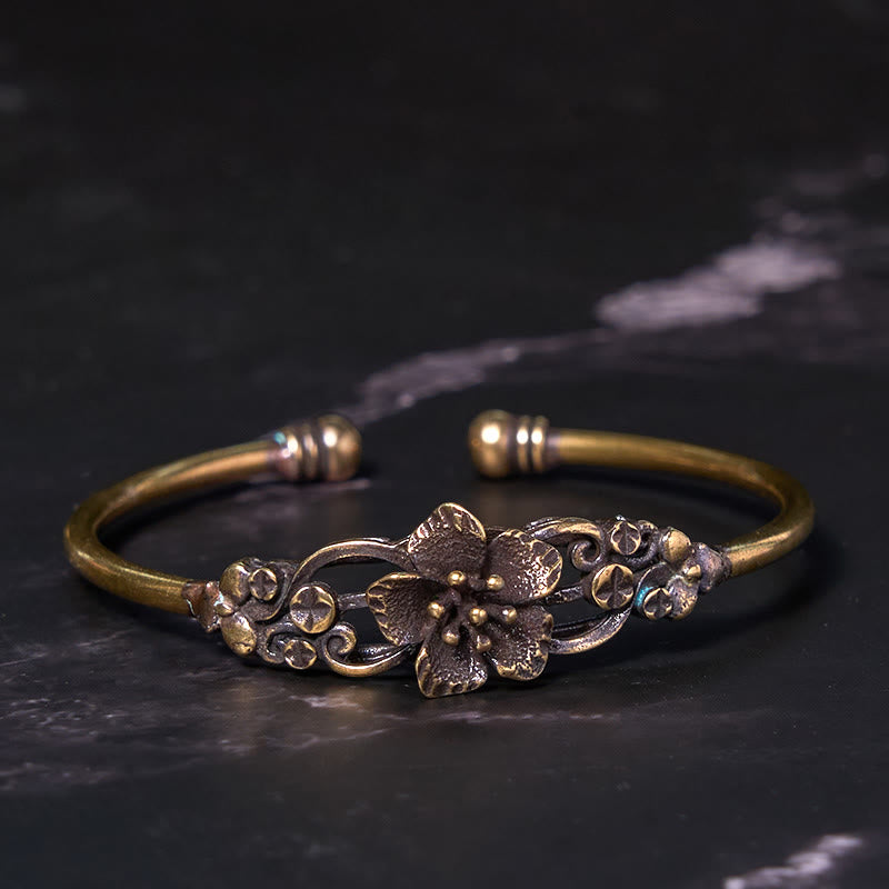 Brazalete de cobre y latón con Buddha Stones, flores, hojas y suerte para la curación