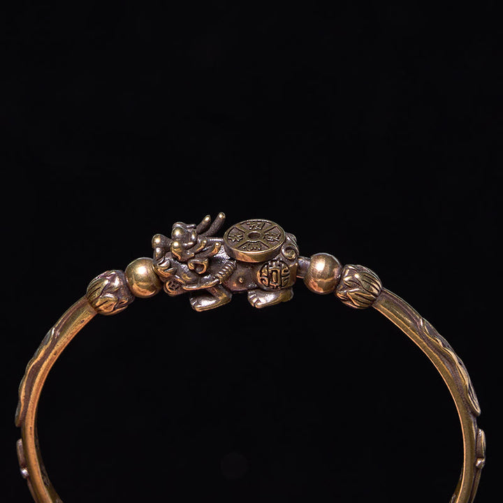 Pulsera brazalete de cobre y latón con lingote de moneda y Buddha Stones