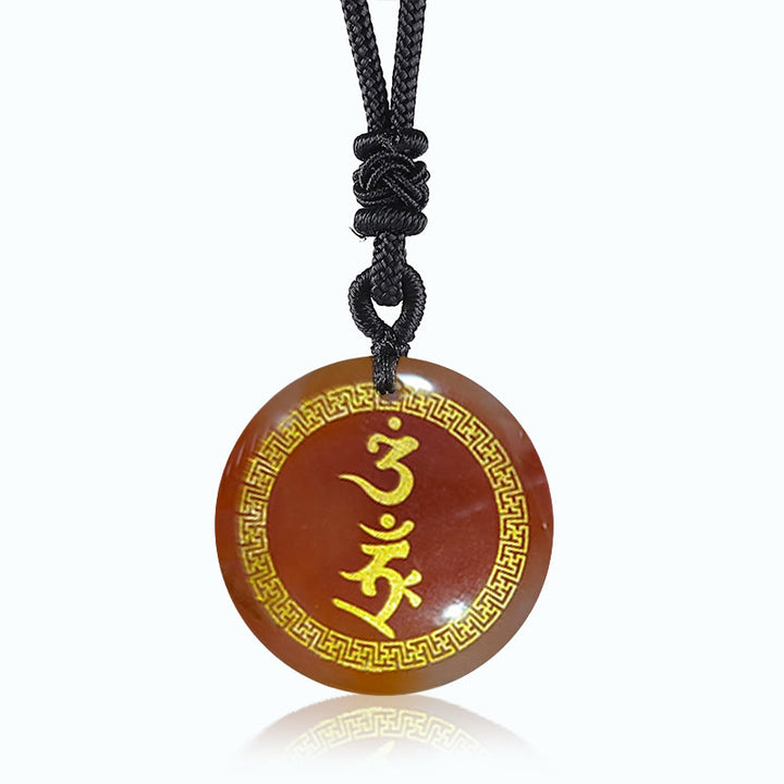 Colgante de collar con obsidiana negra con cristales naturales y mantra de protección Vajra con patrón de esvástica que rodea Buddha Stones