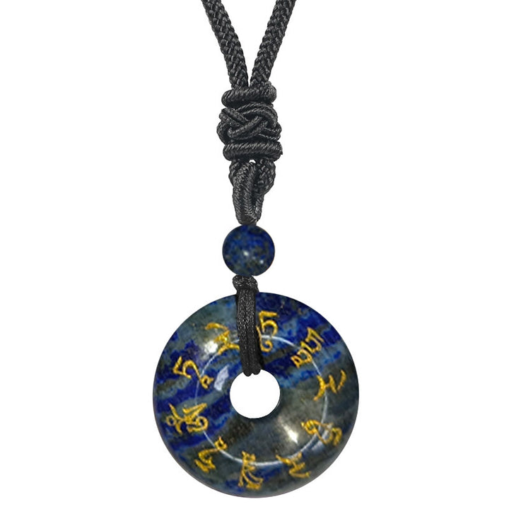 Collar con colgante de obsidiana negra con cristales naturales de varios tipos y Buddha Stones con mantra de Tara verde
