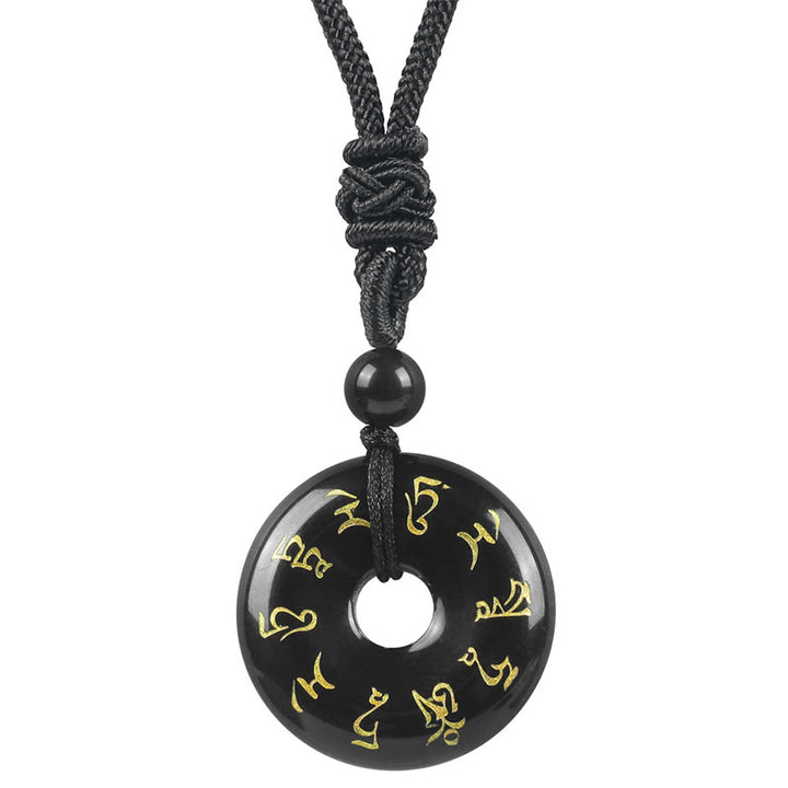 Collar con colgante de obsidiana negra con cristales naturales de varios tipos y Buddha Stones con mantra de Tara verde